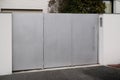 Aluminium door modern high brut raw home gray steel gate portal of suburb house