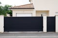 Aluminium modern home black dark and wicket gray steel gate portal of suburb house door