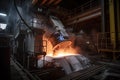 aluminium processing facility, with molten metal being poured into molds and cooled Royalty Free Stock Photo