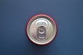 aluminium red cans soft drink put on blue texture background Royalty Free Stock Photo