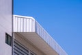 Aluminium steel roof eaves of new industrial building against blue clear sky background Royalty Free Stock Photo