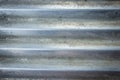 Aluminium striped line wave close-up abstract background. Steel metal zinc texture
