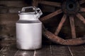 Aluminium water can and old wheel