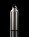 Aluminium water flask on reflective black surface