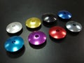 Aluminum anodized parts, color samples on black background