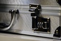 Aluminum attache case lock close up view Royalty Free Stock Photo
