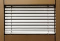 Aluminum blinds on the window Royalty Free Stock Photo