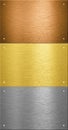 Aluminum and brass metal plates with rivets Royalty Free Stock Photo