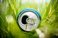 Aluminum can in grass Royalty Free Stock Photo