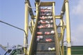 Aluminum cans moving along a conveyor at a recycling center in Santa Monica, California