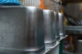 aluminum containers for cooking. Iron tanks lie on the dishwasher.