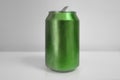 Aluminum Dark Green Soda Can over White Background Royalty Free Stock Photo