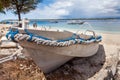 Aluminum fishing boat on shore ocean