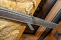 Aluminum frame with hangers placed on beams in the attic for mounting plasterboards. Royalty Free Stock Photo