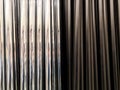 Aluminum pipes. Texture of metal pipes of the same diameter. The vertical arrangement of the elements Royalty Free Stock Photo