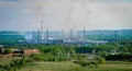 Aluminum plant, smoke from its pipes spoils the environment