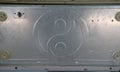 Aluminum plate pattern of yin yang. It is the part of computer case.