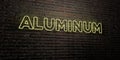 ALUMINUM -Realistic Neon Sign on Brick Wall background - 3D rendered royalty free stock image