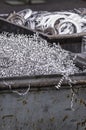 Aluminum swarfs in container Royalty Free Stock Photo