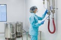 The operator checks the equipment for the production of sterile Royalty Free Stock Photo