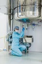 The operator checks the equipment for the production of sterile Royalty Free Stock Photo