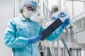 The operator checks the equipment for the production of sterile Royalty Free Stock Photo