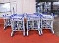Aluminum Trolley in airport. Luggage carts at modern airport. For travelers with large luggage to travel with. Royalty Free Stock Photo