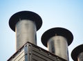 Aluminum ventilation chimneys Installed on the factory roof. Royalty Free Stock Photo
