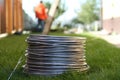 Aluminum wire coil on the grass