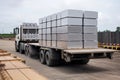 alumum ingot being transported by truck to manufacturing facility Royalty Free Stock Photo