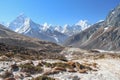 Ama Dablam mountain peak rises above mountain valley in Himalayas Royalty Free Stock Photo