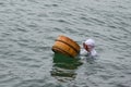 Ama female diver working on the sea