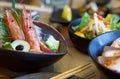 AMAEBI, sweet shrimp or spot prawns, served on ice with slice of japanese cucumber, green tosaka nori and fresh wasabi. There are Royalty Free Stock Photo