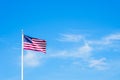 Amaerican flag on pole with blue sky Royalty Free Stock Photo