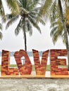 Amaizing design signage wording love at the garden.