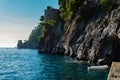 Amalfi coast line with rocky shore and boat of mediterranean sea from Positano Royalty Free Stock Photo