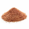 Amaranth seeds piled on a surface, highlighting their tiny size and earthy color in a natural setting
