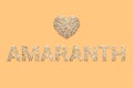 Amaranth seeds texture text with heart shape on pastel peach color background.