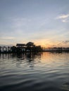 Amarapura, Myanmar - November 6, 2019: U Bein Bridge across the Taungthaman Lake in Amarapura, during sunset Royalty Free Stock Photo