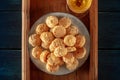 Amaretti, traditional Italian almond cookies, with a glass of Amaretto liqueur, top shot