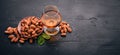 Amaretto Almond Liquor. Almond On a wooden background. Italian drink Top view. Royalty Free Stock Photo