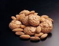 Amaretto cookies: typical Italian food on black background Royalty Free Stock Photo