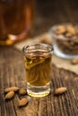 Wooden table with Amaretto Shots detailed close-up shot; selective focus Royalty Free Stock Photo