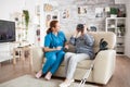 Amased elderly age woman while using virtual reality glasses