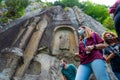 Amasra, Turkey- June 26 2021: Tourists visit Roman monument Kuskayasi Aniti in Turkish during pandemic with face mask