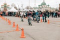 Amateur competition of children to balance bicycle on Lenin Square. A boys and girls on balance bicycle