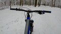 Amateur enduro rider on the bicycle in the winter season