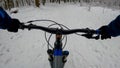 Amateur enduro rider on the bicycle in the winter season