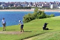 Amateur golf players playing in Santander Golf Club