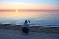 Amateur photography of gulls on the water of the bay during a colorful sunset. Jurmala Latvia 3 June 2019